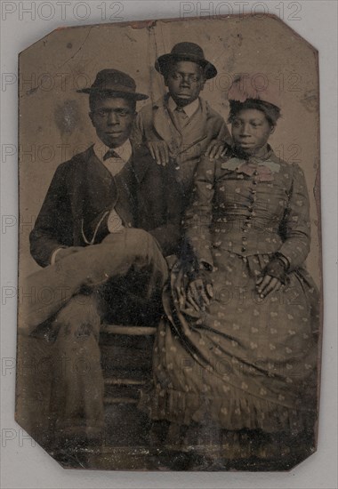 Untitled (Portrait of Two Young Men and One Young Woman), 1875. Creator: Unknown.