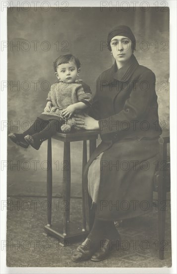 Untitled postcard (Woman with Boy on Stand), 1873. Creator: Unknown.