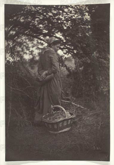 Woman Standing with Basket on Ground, 1870. Creator: Giraudon's Artist.