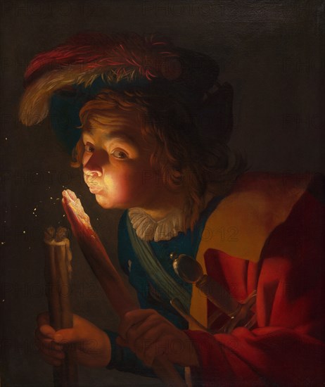 A Boy Blowing on a Firebrand, 1621/22. Creator: Gerrit van Honthorst.