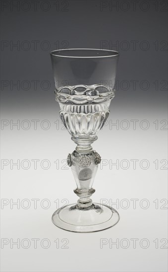 Wineglass Containing Two Uncirculated Charles II Silver Coins Dated 1670 and 1671, , c. 1690-1710. Creator: Unknown.