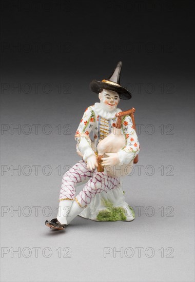 Harlequin with Bagpipes, Meissen, c. 1740. Creator: Meissen Porcelain.