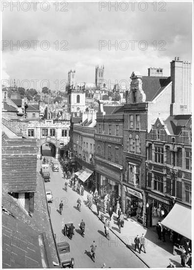 High Street, Lincoln, Lincolnshire, early 1930s. Creator: J Dixon Scott.