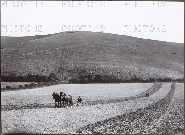 Ploughing under the shadow of the Dyke, 1930s. Creator: J Dixon Scott.