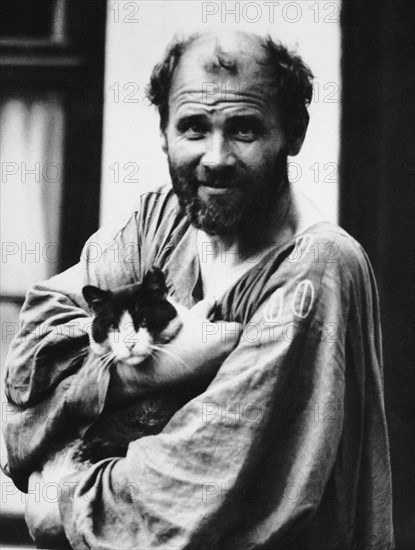 Gustav Klimt with a cat, 1911. Creator: Nähr, Moritz (1859-1945).