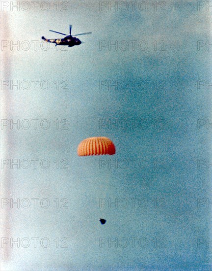 Gemini 12 descends for splashdown, 1966. Creator: NASA.