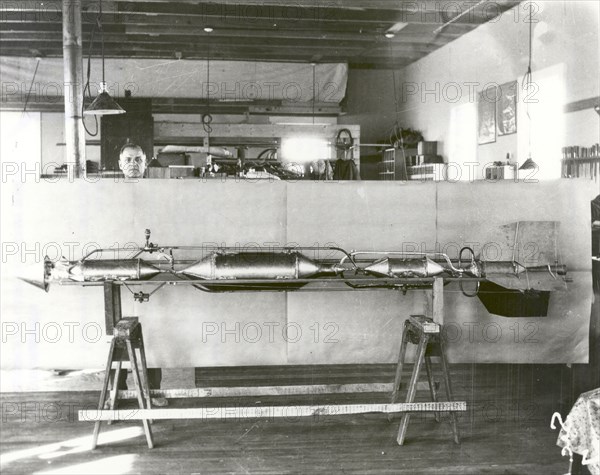 Henry Sachs with Robert Goddard's Rocket in New Mexico, USA, 1930. Creator: NASA.