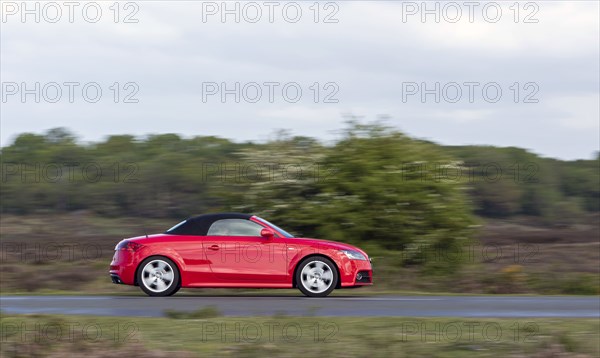 Audi TT cabriolet driving in New Forest. Creator: Unknown.