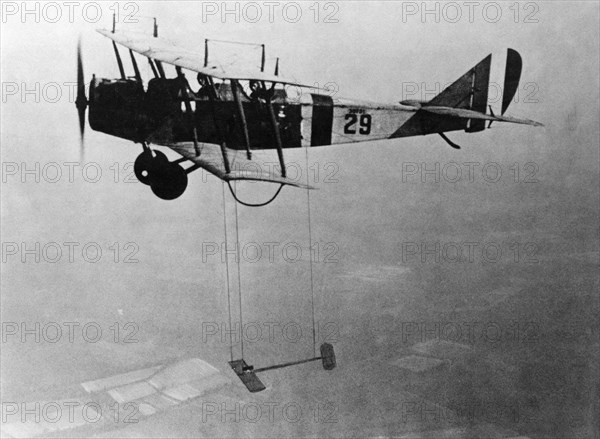 Curtiss JN-4 "Jenny" aircraft with model wing suspended, June 22, 1921. Creator: Unknown.