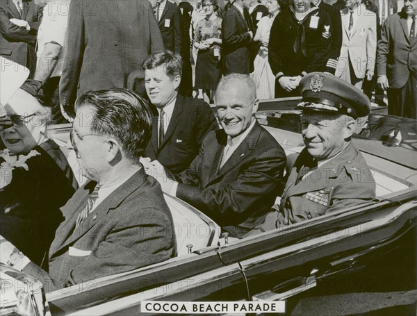 President John F. Kennedy, John Glenn and General Davis in Cocoa Beach Parade, 1962.  Creator: NASA.