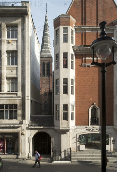 Spire of All Saints Church, Margaret Street, from Great Titchfield Street, Marylebone, London, 2014. General view of the street looking east between numbers 12 and 14 towards the spire of All Saints Church on Margaret Street.