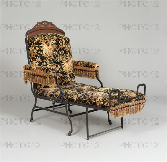 Chair, 1876. Folding chair with fringe decoration, used as an invalid chair, a smoking chair, or a bed.