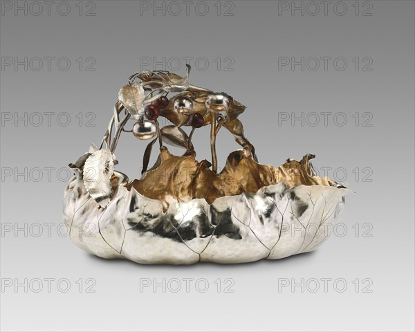 Berry Bowl, 1885/95. Decorative silverware, handle formed of entwined branches and leaves, plums and copper cherries, with a fly, a beetle, and a spider. Design attributed to George W. Shiebler, made by Shiebler, or George W. Shiebler and Company.