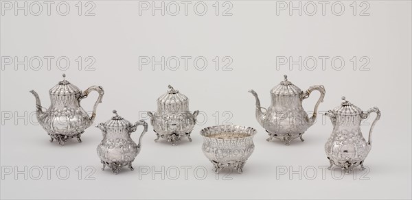 Tea Service, 1850. Repoussé decoration of trees and pastoral scenes.