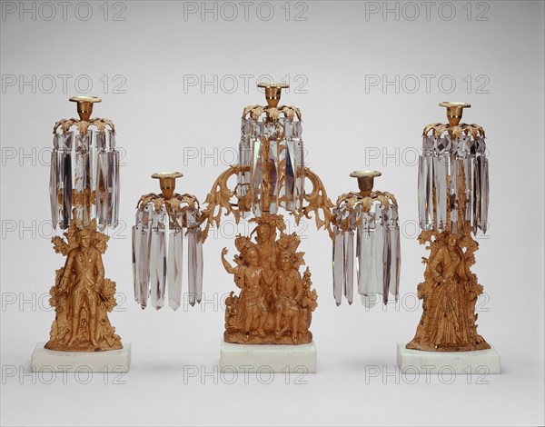 Girandoles, 1848/51. Bronze gilt candlesticks inspired by 'The Last of the Mohicans': Chief Chingachgook, Natty Bumppo, Unicas, Major Duncan Heyward, Cora Munro. Designed by Isaac F. Baker.