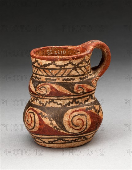 Miniature Handled Jug with Spiral and Zigzag Motifs, A.D. 400/1000.