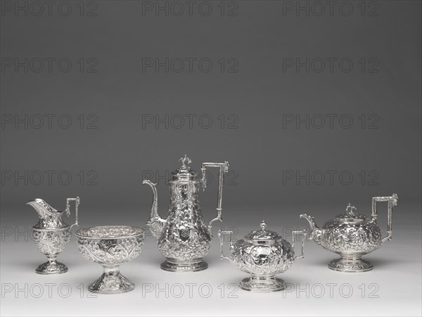 Tea and Coffee Service, 1840/68. Repoussé decoration with geometrical handles.