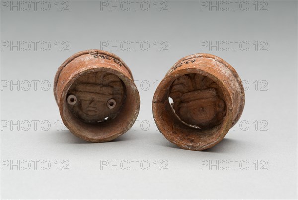 Pair of Ear Plugs with Face of Figure in Interior, A.D. 300/750 A.D.