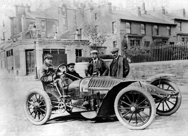 Herbert Austin behind the wheel of a Wolseley, Gordon Bennett Cup eliminating trials, 1904. Creator: Unknown.