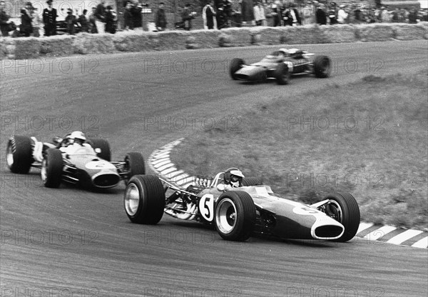 Jim Clark driving his Lotus 49 R3 DFV at the Dutch Grand Prix, Zandvoort, Netherlands, 1967. Creator: Unknown.