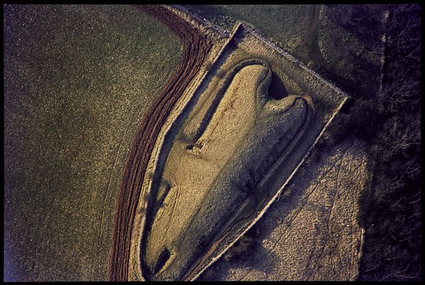 Belas Knap, a Neolithic chambered long barrow, Winchcombe, Gloucestershire, 1971. Creator: Jim Hancock.