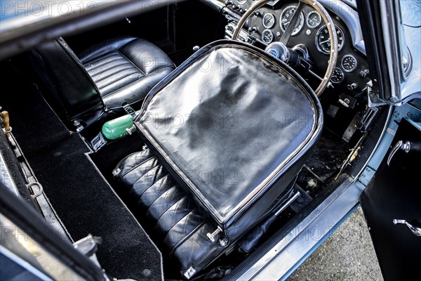 Folded down driver's seat of a 1961 Aston Martin DB4 GT SWB lightweight. Creator: Unknown.