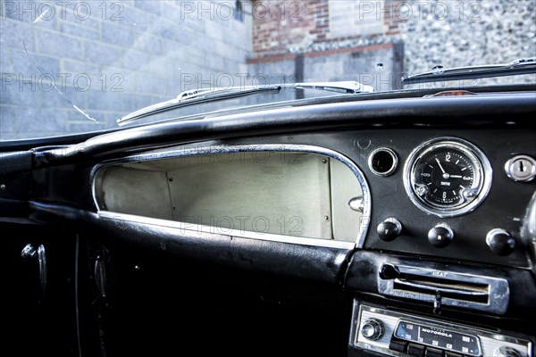 Glove compartment of a 1961 Aston Martin DB4 GT SWB lightweight. Creator: Unknown.