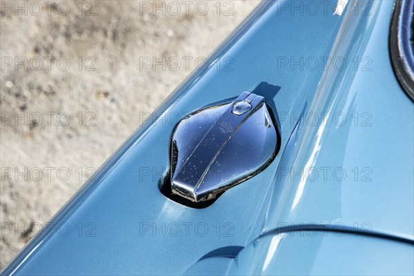 Petrol filler cap of a 1961 Aston Martin DB4 GT SWB lightweight. Creator: Unknown.