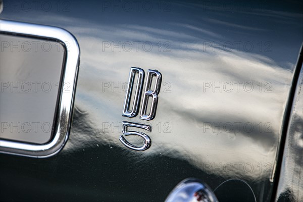 Logo on a 1965 Aston Martin DB5. Creator: Unknown.