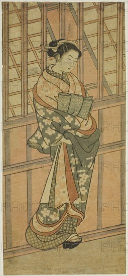Courtesan Standing in Front of a Barred Window, c. 1765. Attributed to Ishikawa Toyonobu.