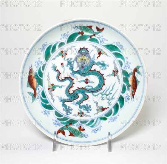 Dish with Dragon amid Flames Encircled by Fish amid Waves, Qing dynasty (1644-1911), 18th/19th century.