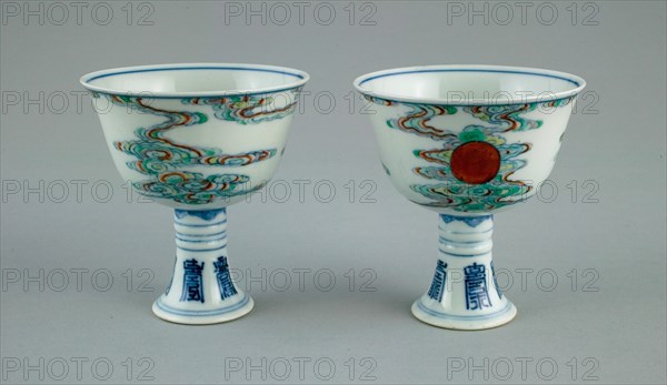 Pair of Stem Cups with Sun amid Clouds and Stylized Characters for 'Long Life' (Shou), Qing dynasty (1644-1911), Yongzheng reign mark and period (1723-1735).