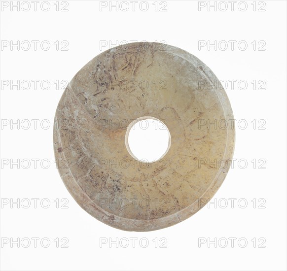 Disc with Coiled Dragon, Western Zhou period, 11th/10th century B.C.