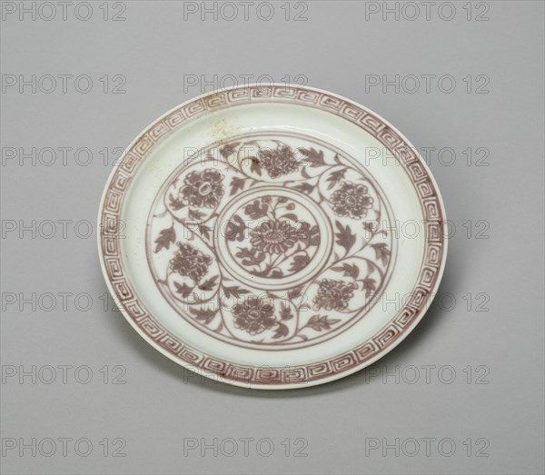 Shallow Dish with Peony Scrolls, Chrysanthemum Sprays, and Key-Fret Border; Lotus Panels Panels Under Rim, Ming dynasty (1368-1644), Hongwu period (1368-1388).