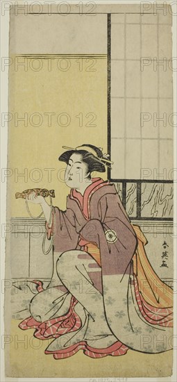 The Actor Iwai Hanshiro IV as Yae (?), in the Play Sugawara Denju Tenarai Kagami (?), Performed at the Kiri Theater (?) in the Seventh Month, 1788 (?), c. 1788.