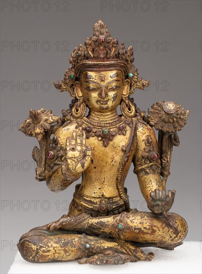 Bodhisattva Avalokiteshvara Seated with Hand in Gesture of Reassurance (Abhayamudra), 15th/16th century.