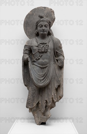 Standing Bodhisattva with Human-Figure Necklace, Kushan period, 2nd/3rd century. Ancient region of Gandhara (modern Pakistan).