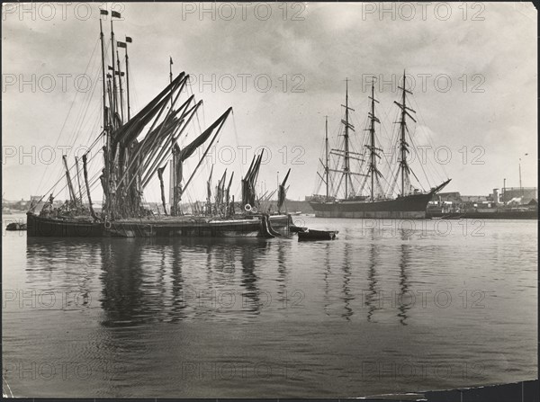 Sailing vessels at anchor on the River Medway below Rochester Bridge, Rochester, Medway, 1925-1935. Creator: J Dixon Scott.