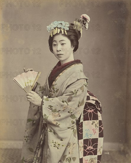 Young Woman with Fan, c. 1890. Creator: Kimbei, Kusakabe (1841-1932).
