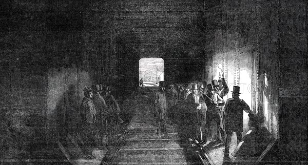 Interior of the Tube - Mr. Stephenson Driving the Last Rivet, 1850. Creator: Unknown.