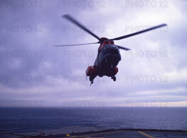 Helicopter on an aircraft carrier, Falklands War, 1982. Creator: Luis Rosendo.