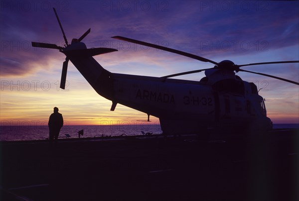 Helicopter on an aircraft carrier, Falklands War, 1982. Creator: Luis Rosendo.