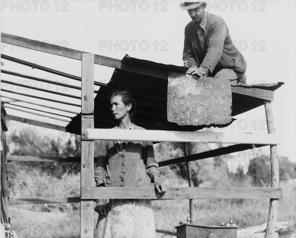 Dispossessed Arkansas farmers, Bakersfield, California, 1935. Creator: Dorothea Lange.