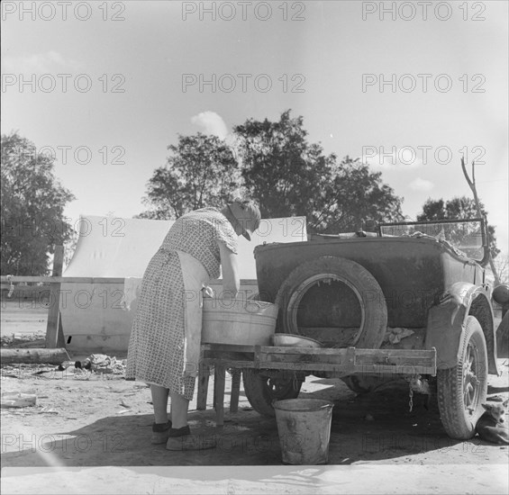 Blue Monday in a California migratory camp, 1936. Creator: Dorothea Lange.