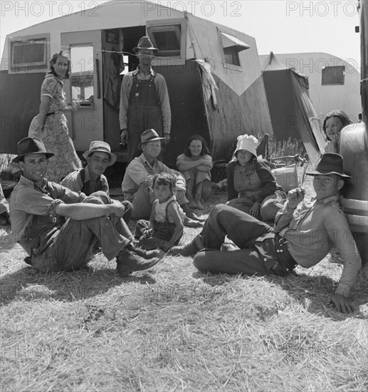 Migrant family in Farm Security Administration camp, Westley, California, 1938. Creator: Dorothea Lange.