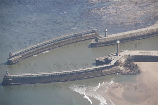 The breakwaters at the entrance to Whitby Harbour, North Yorkshire, 2016. Creator: Dave MacLeod.