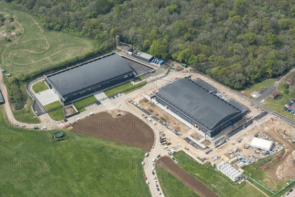 Repurposed aircraft hangars, Hullavington Airfield, Wiltshire, 2019. Creator: Damian Grady.