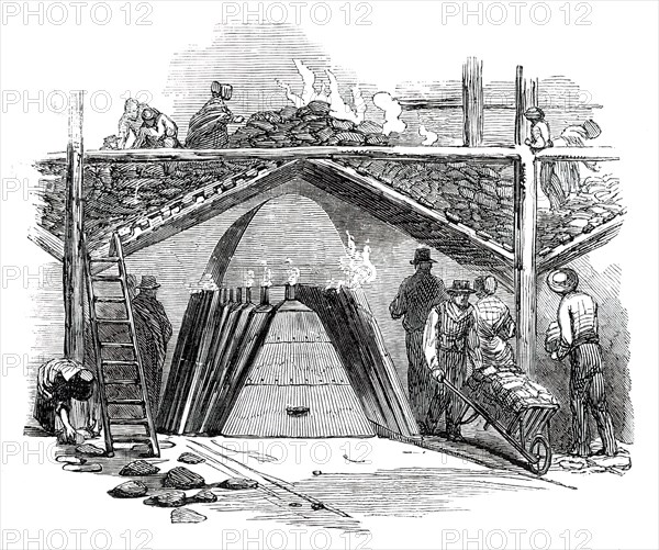 One of the Retorts for Burning the Turf into Charcoal, 1850. Creator: Smyth.