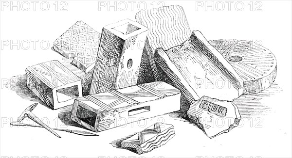 Flue-Tiles, Quern, and Other Roman Articles Found at Lymne, 1850. Creator: Unknown.