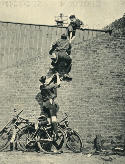 'Scouts Scaling a Wall', 1944. Creator: Unknown.